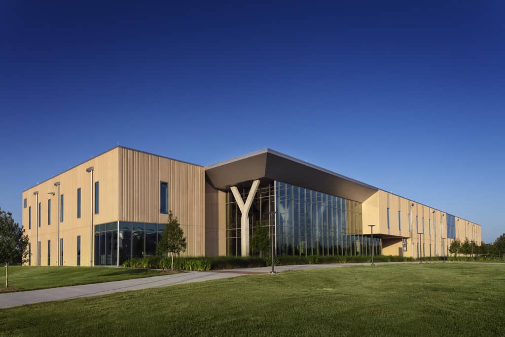 Modern building with large glass facade at dusk