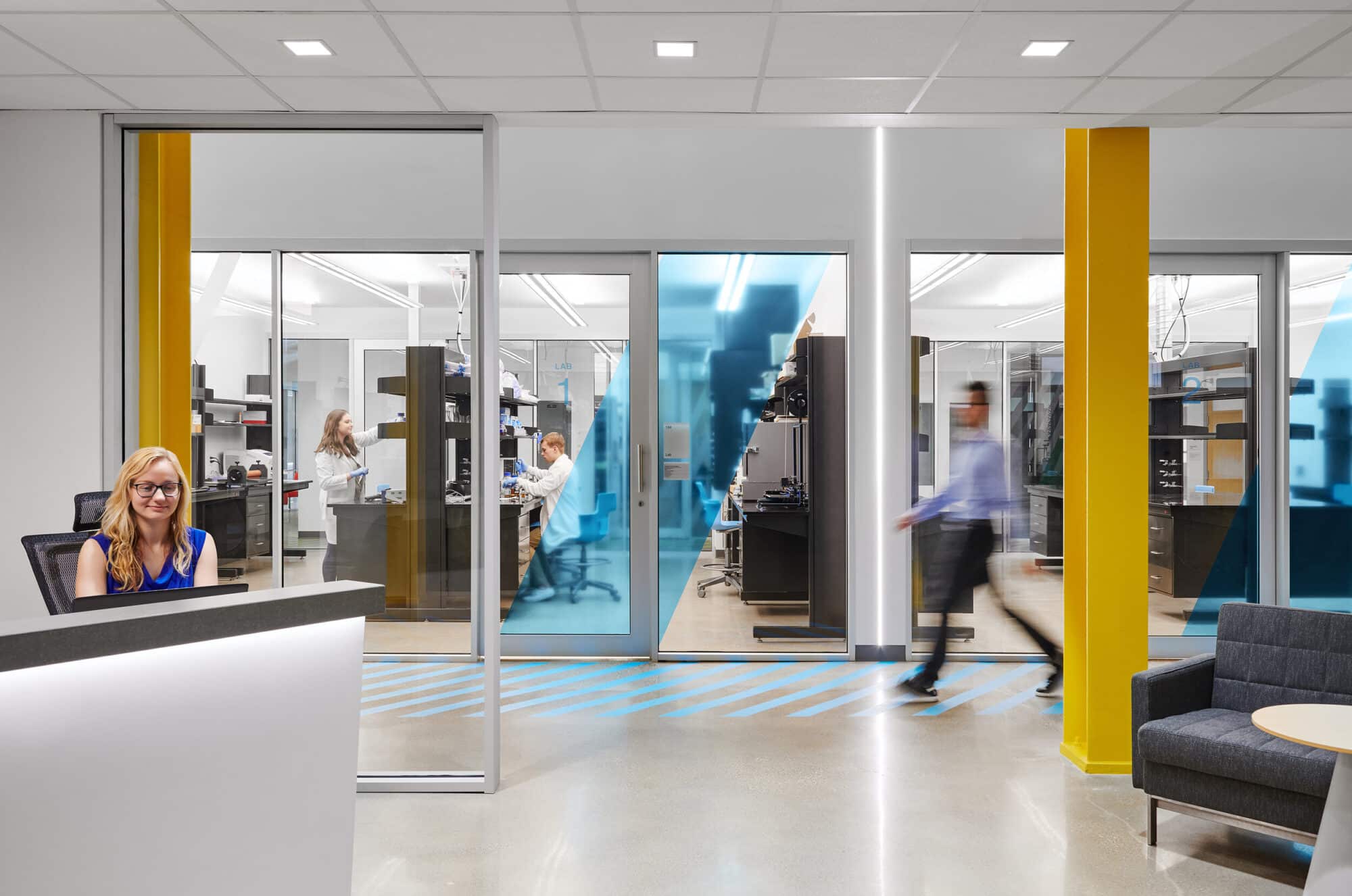 Modern office lobby and busy laboratory interior