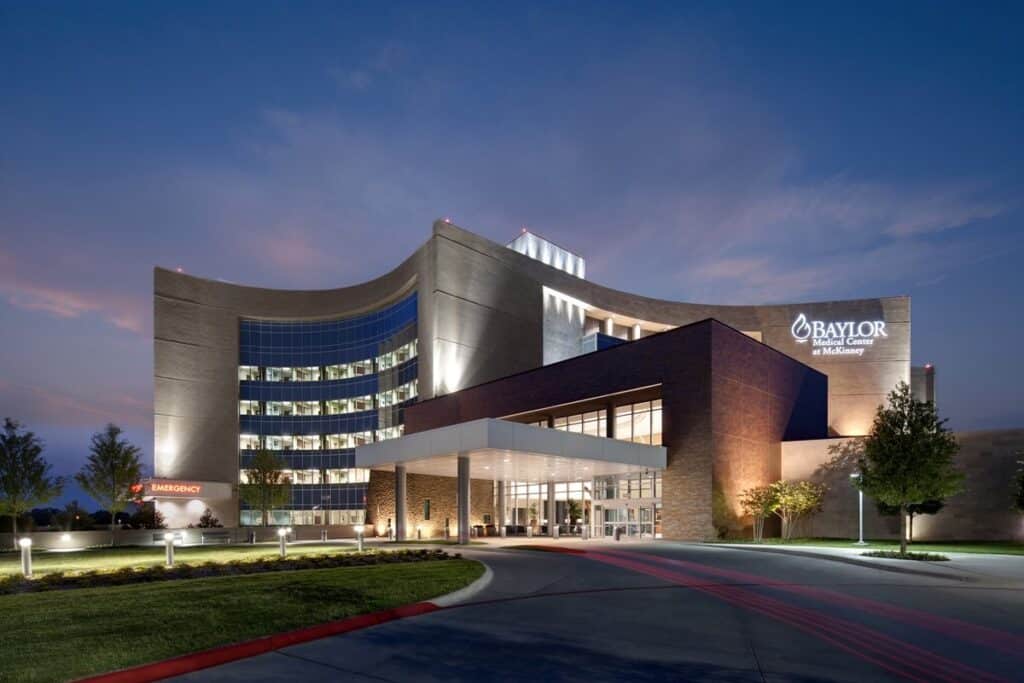 Modern hospital building at twilight.