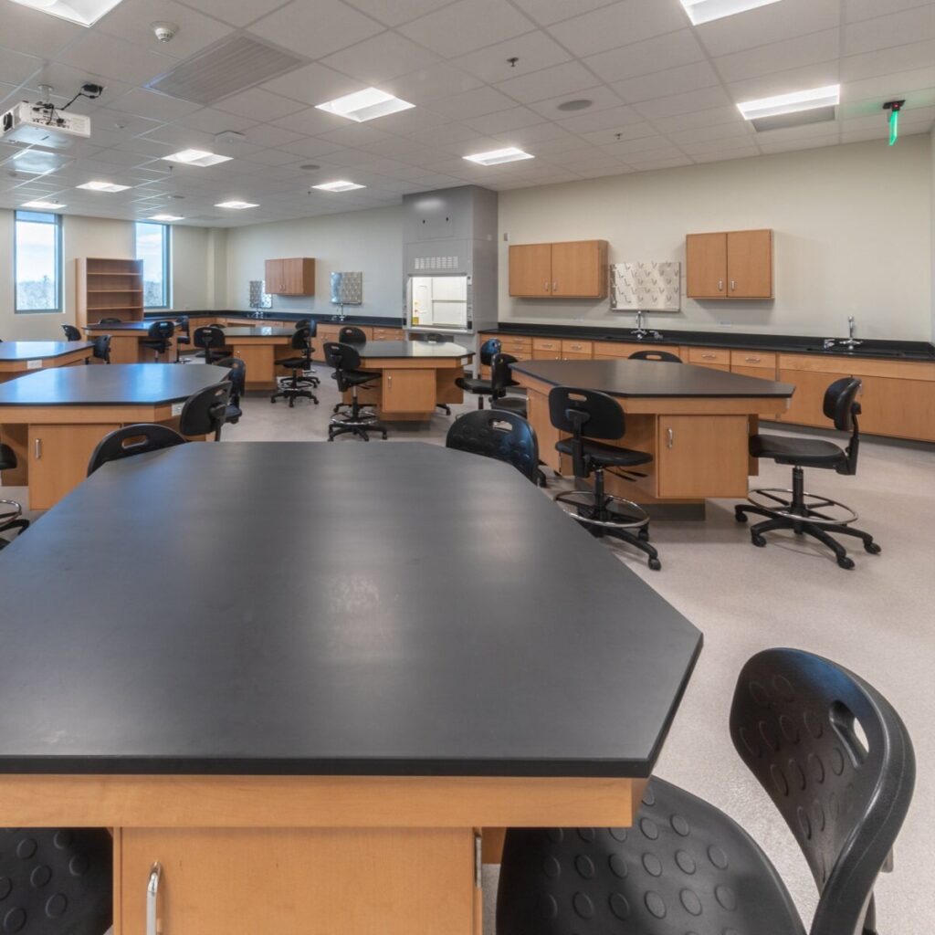 Modern empty science laboratory classroom interior