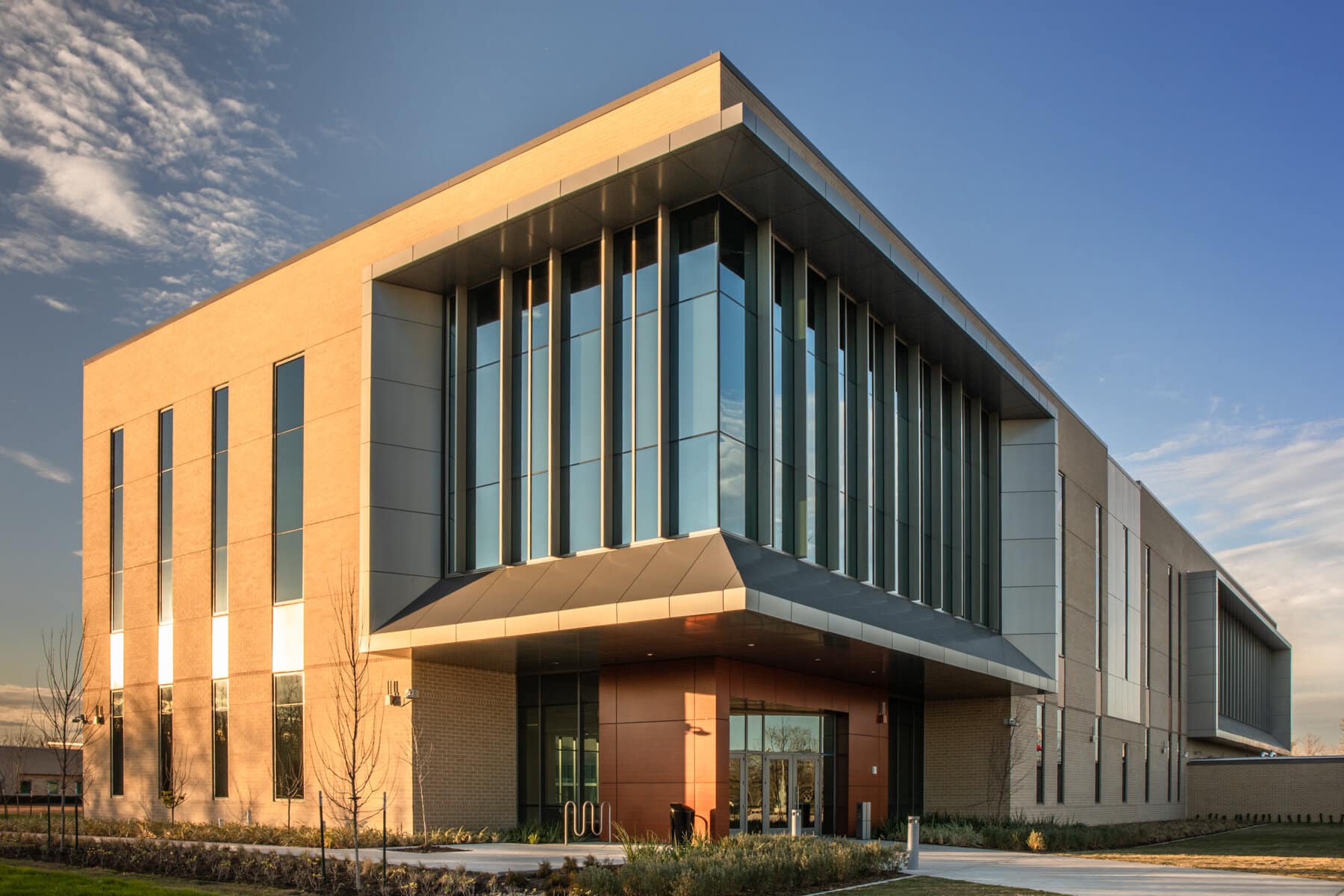 Modern office building exterior at sunset