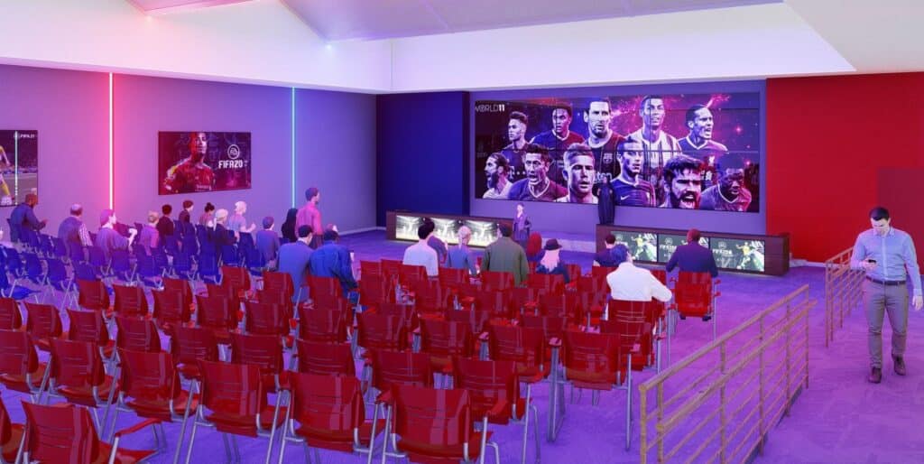 Audience in esports gaming event venue.