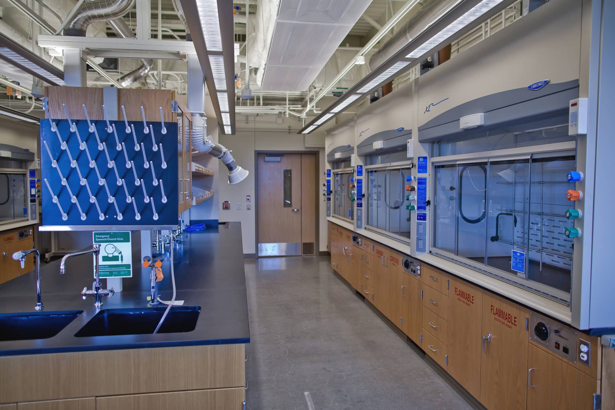Modern chemistry laboratory interior with equipment.