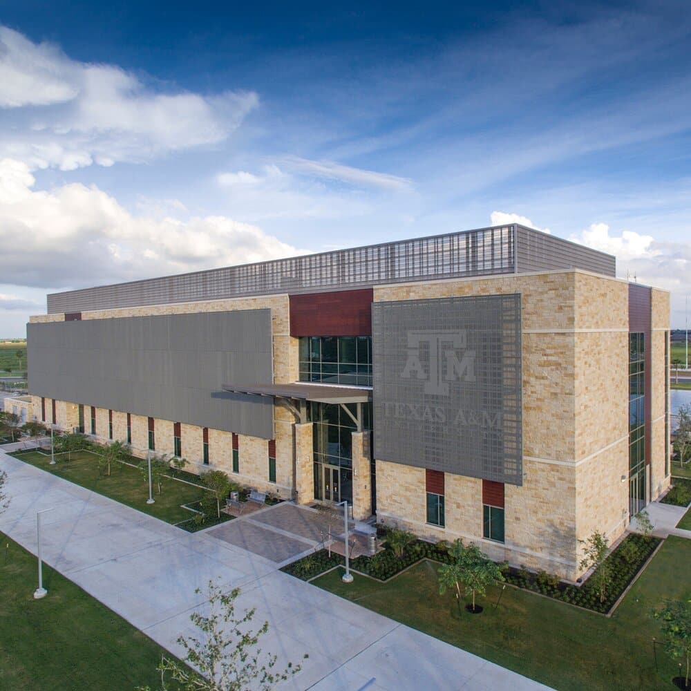 Texas A&M University modern building exterior with logo