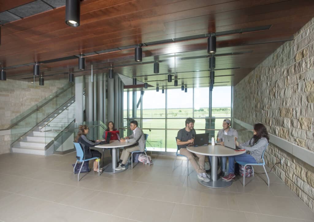 Group of people having a meeting in modern office space