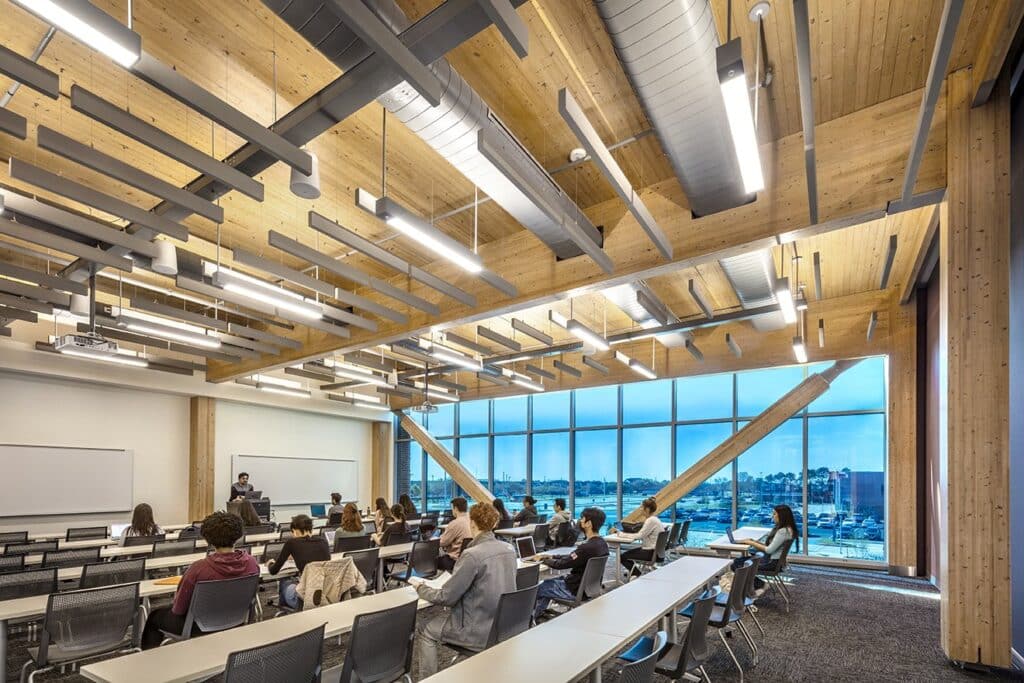 Modern classroom with students and instructor.