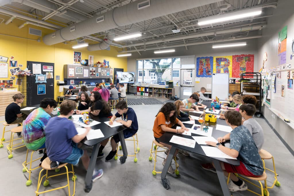 Students engaged in art class at school.